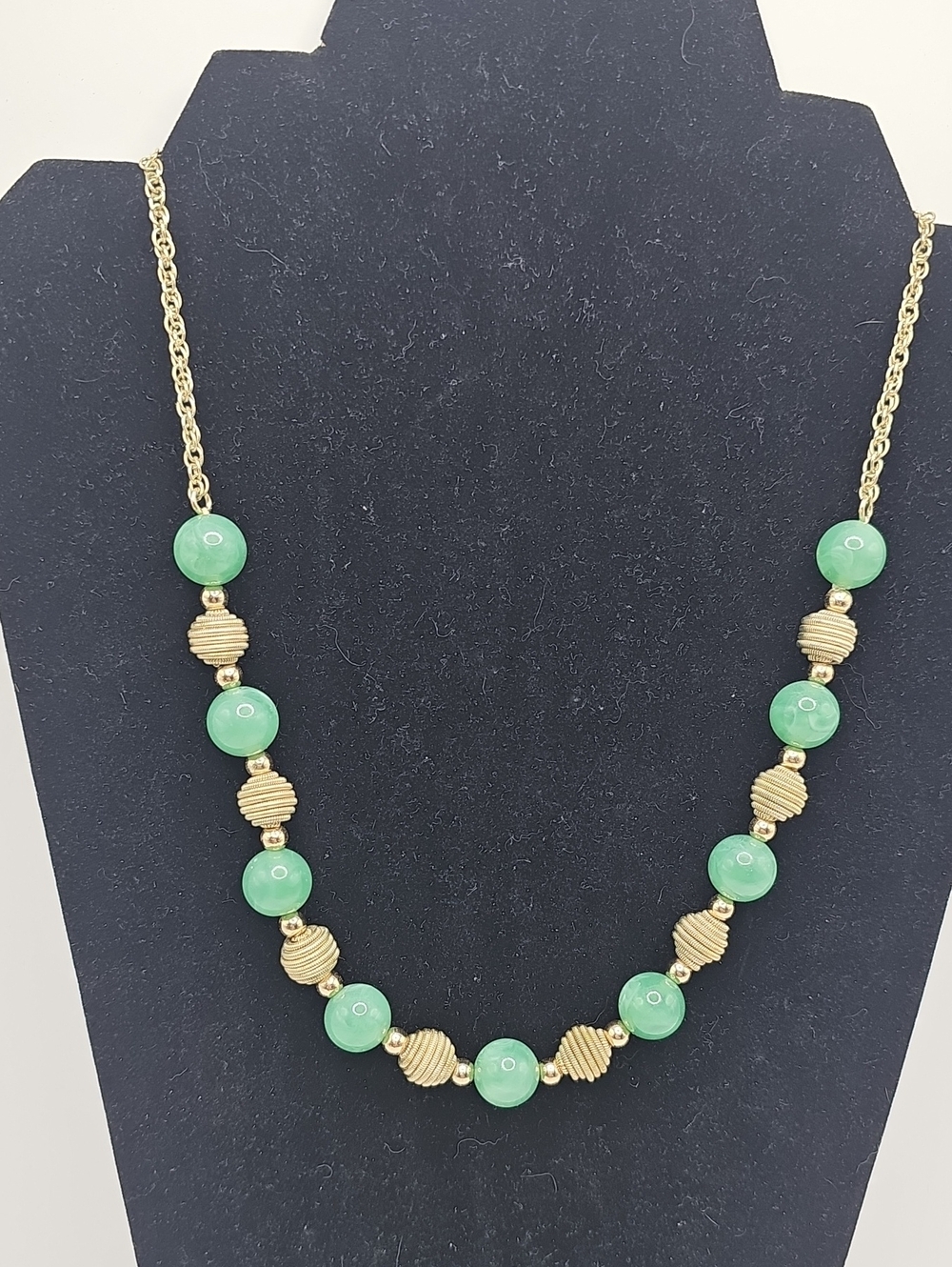 Monet Vintage Gold Beaded Necklace with Green Gemstone Accents